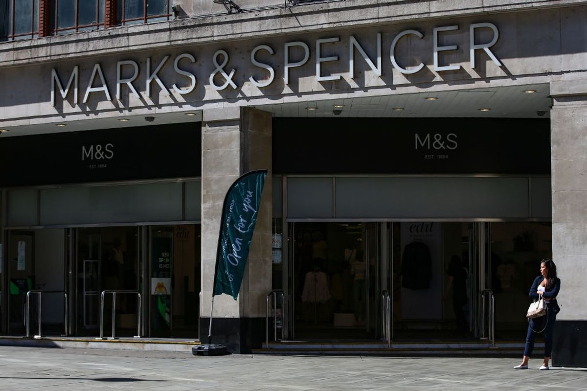 Marks & Spencer store sign with online clothing order notice after cyberattack