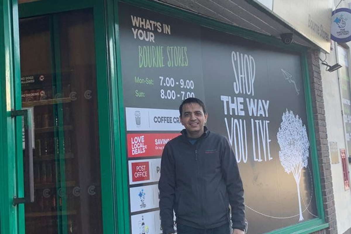 Surrey retailer wins community hero award from local MP