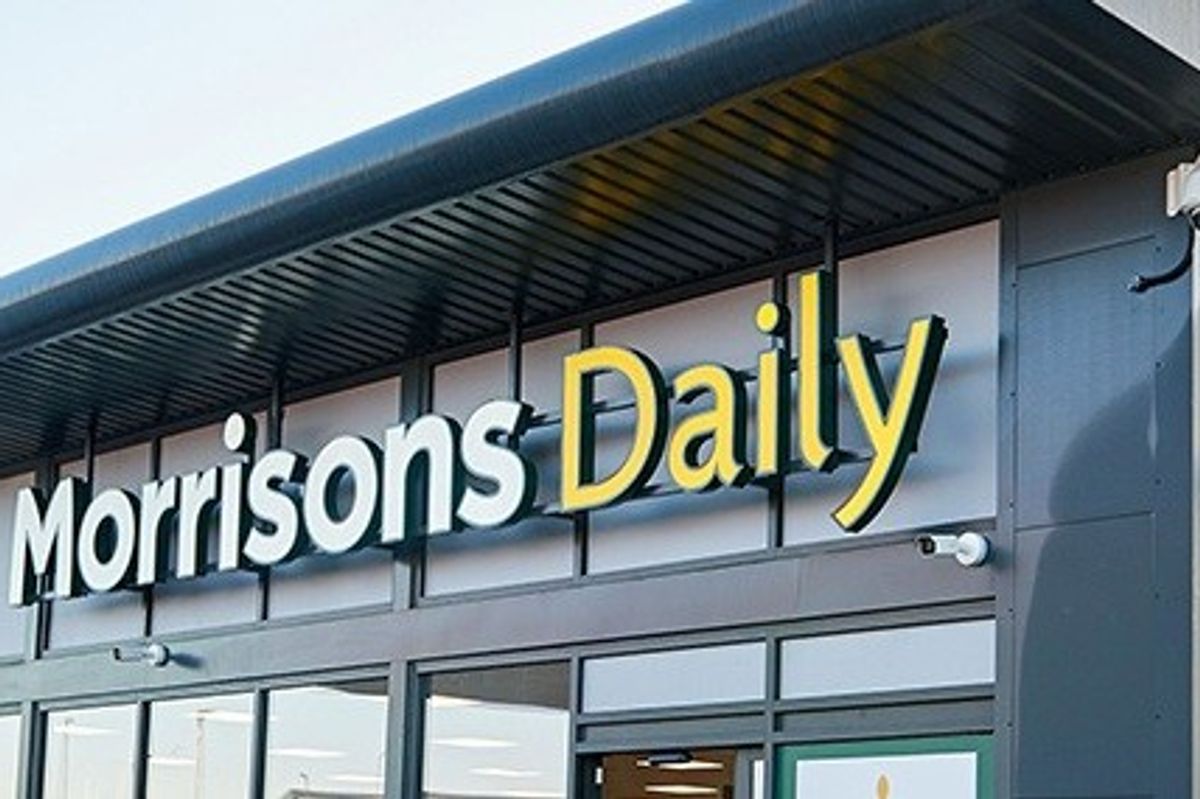 Morrisons convenience store with closing sign