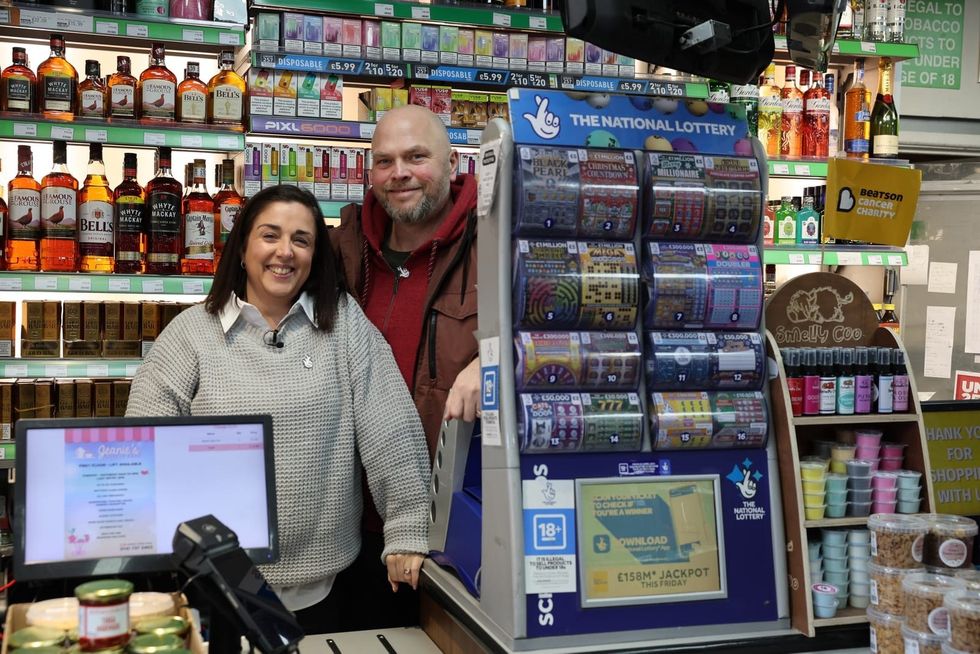 Natalie Lightfoot, owner of Londis Solo Convenience, smiling proudly outside her store in Glasgow.