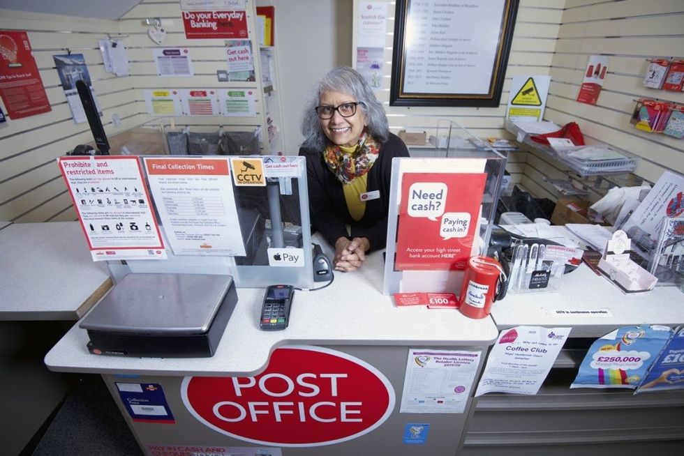 Nazra Alam behind the counter