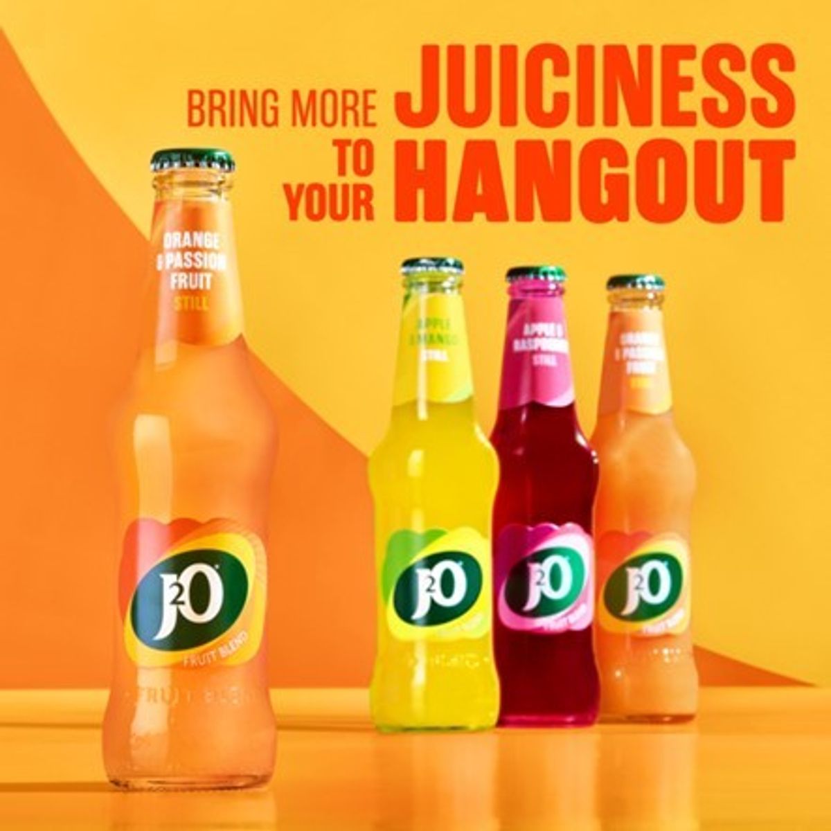 New J2O bottle packaging with modern logo and QR code promotion for summer holiday voucher giveaway