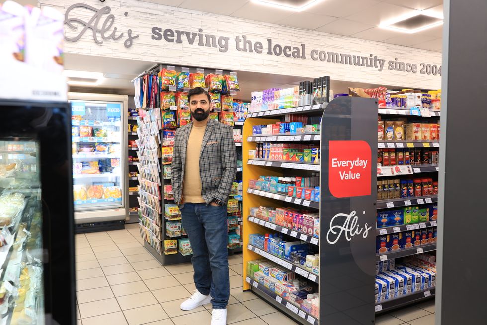 Nisa Royston aisle with Co-op products, clear labels, and branded gondola ends.