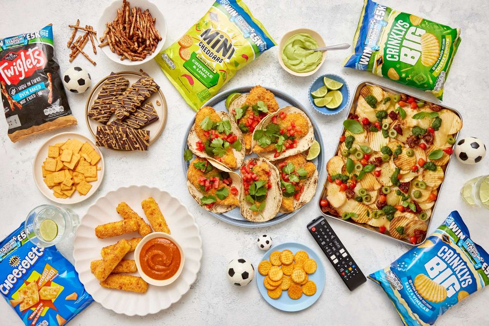 Overhead view of a football-themed snack spread featuring Jacob\u2019s products