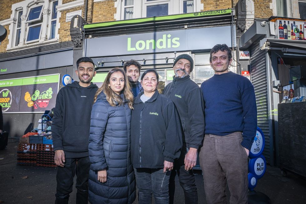 Patel family in front of Londis N16 store in Stoke Newington