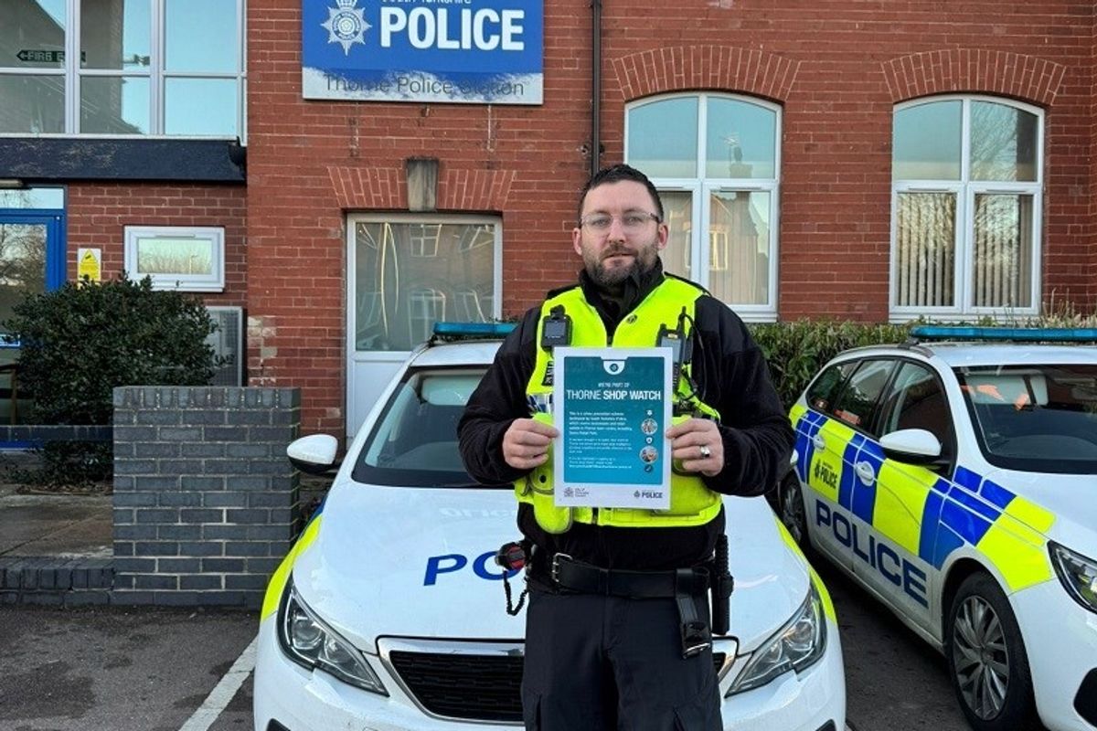 PC John Sharp with the Thorne Shop Watch poster
