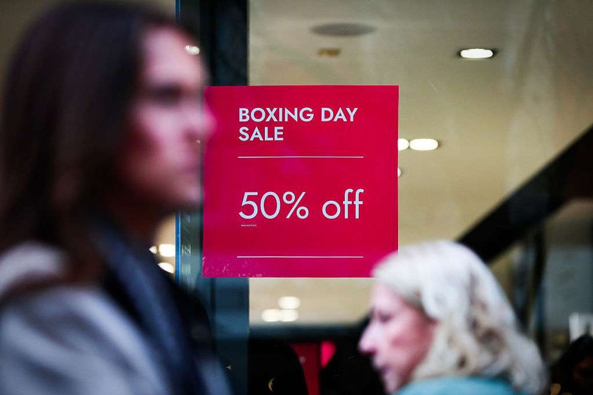 People shop on Oxford Street for post Boxing Day sales