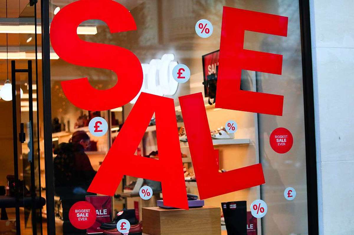 People shop on Oxford Street