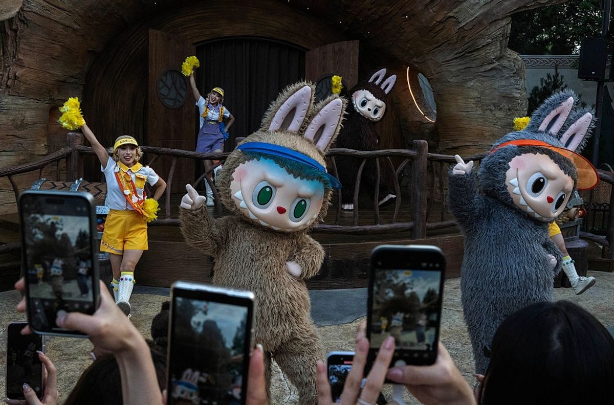 ​Performers wear costumes of characters from Pop Mart's hugely popular Labubu dolls series