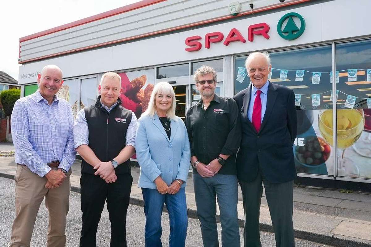 Peter Dodding, Phil Bridge, Sue Masters, Nigel Masters, Ian Hall in front of SPAR Oswaldtwistle