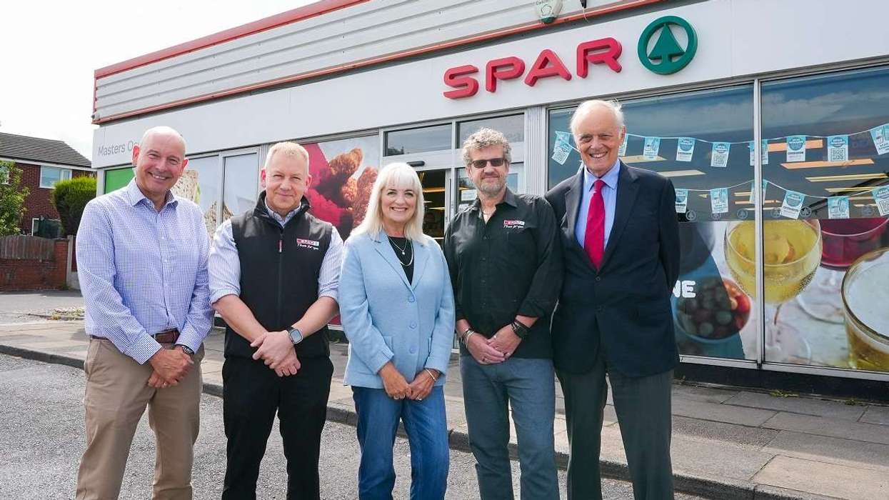 Peter Dodding, Phil Bridge, Sue Masters, Nigel Masters, Ian Hall in front of SPAR Oswaldtwistle