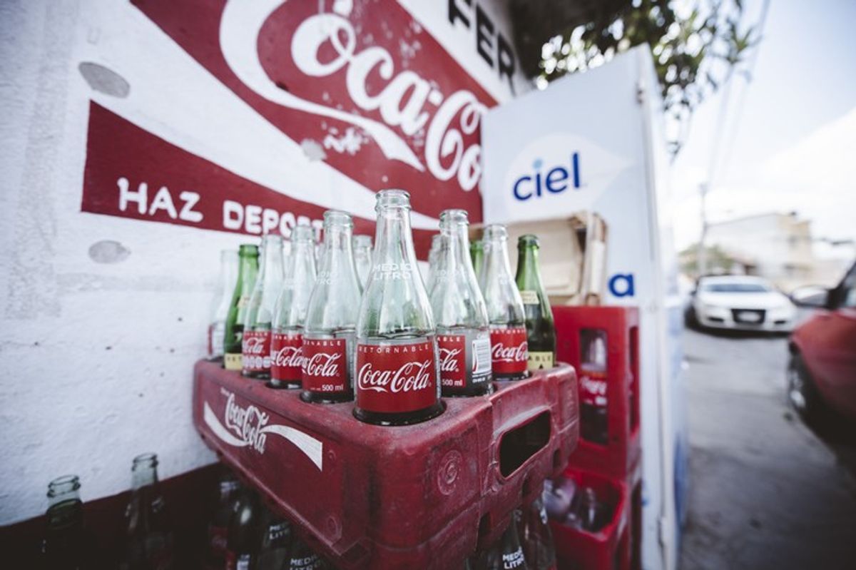 Coca-Cola profits up but inflation poses 'uncertainty'