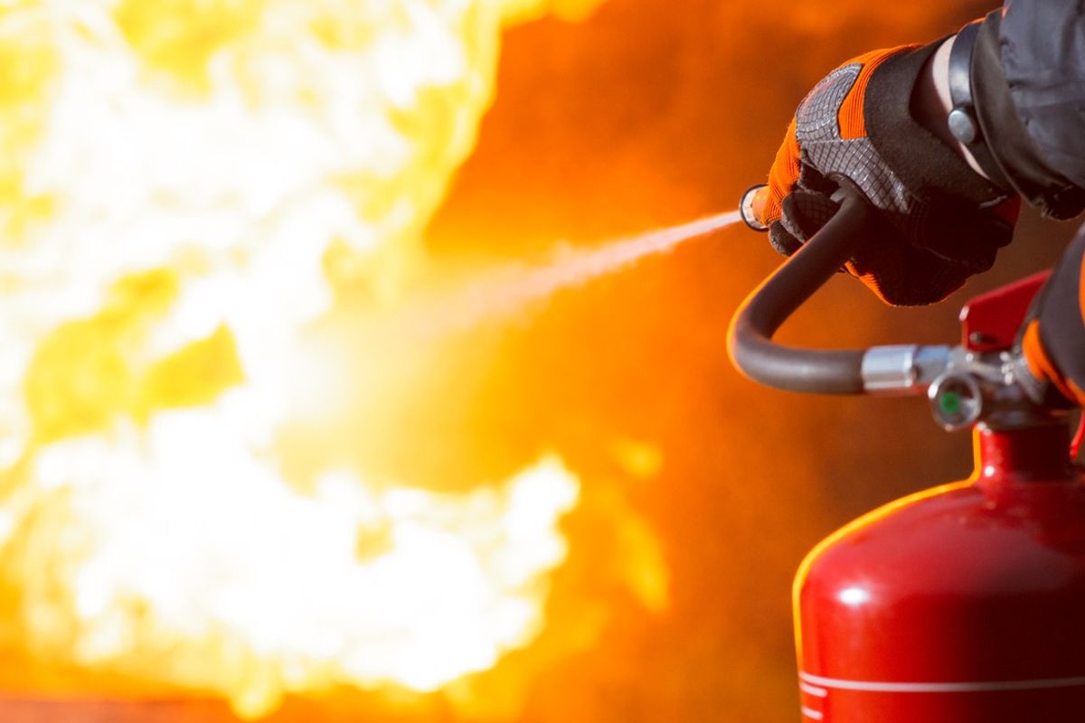 Four taken to hospital after shop fire