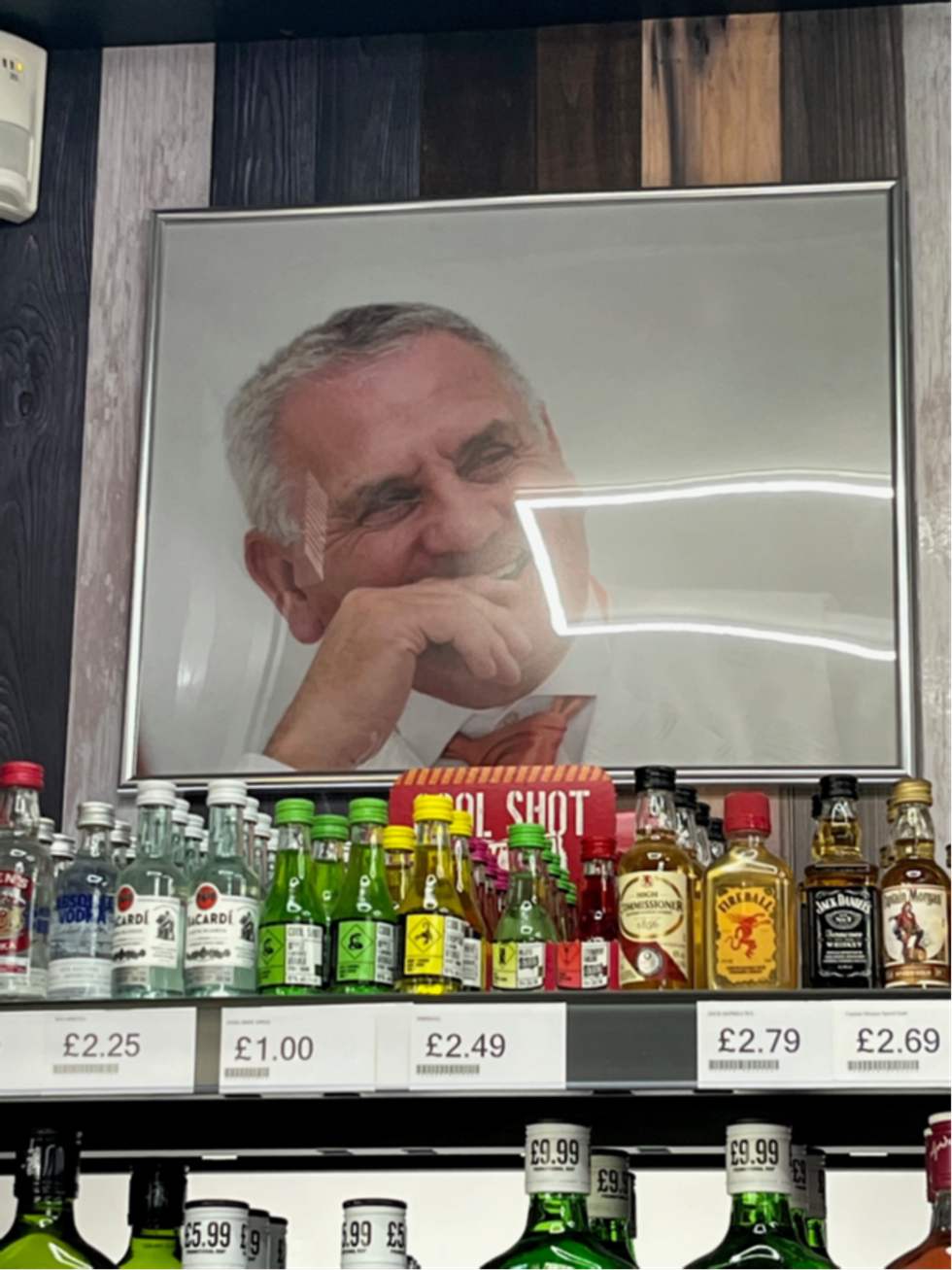 Photo of former owner Tom Bailey in Premier Rassau Stores, Ebbw Vale, preserving community ties