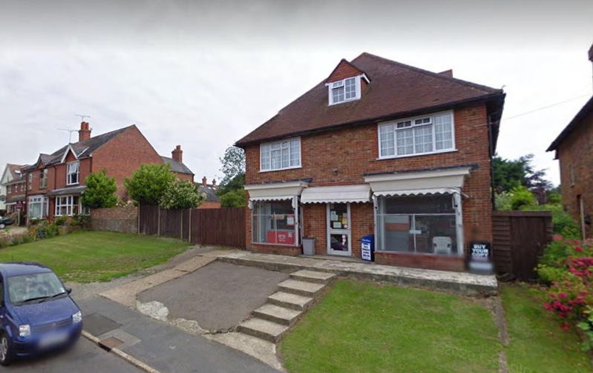 Replacing former village newsagent with flats rejected