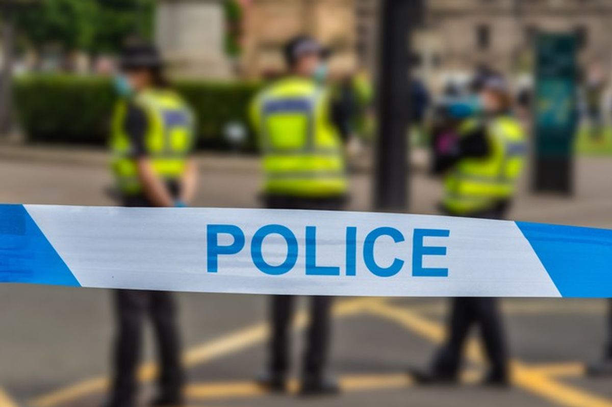 Police hunt suspects after armed shop raids