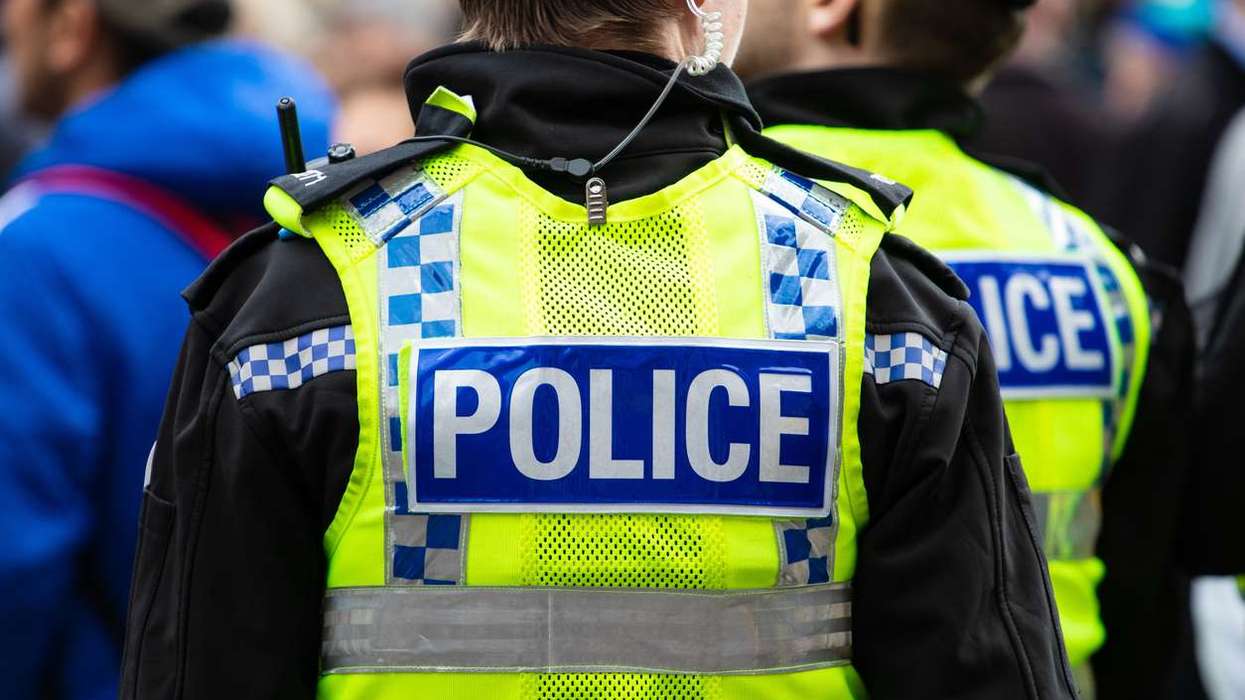 police officers in yellow vests