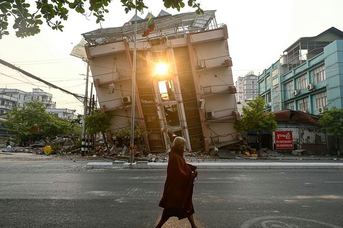 Post Office branch counter with DEC Myanmar Earthquake Appeal donation sign