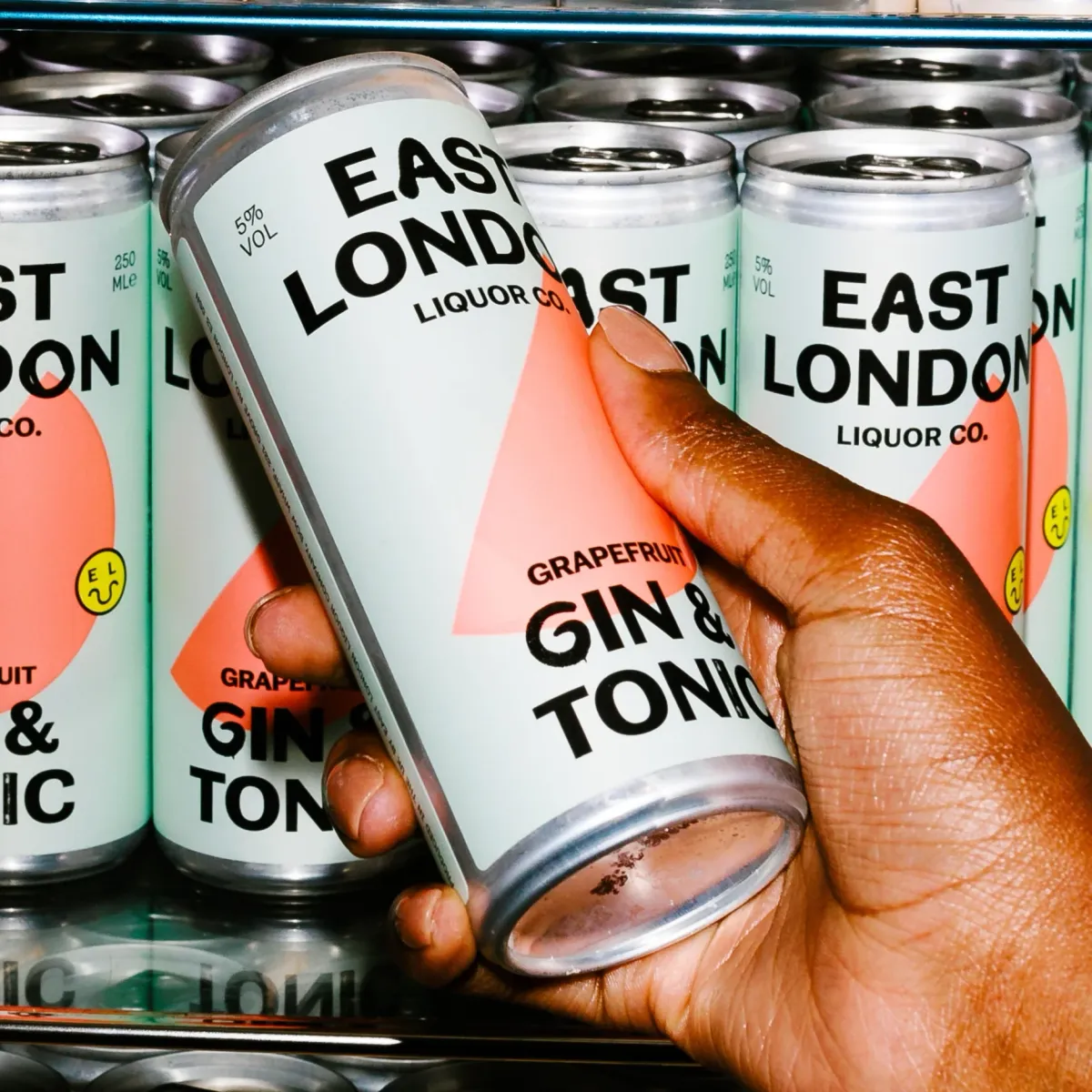 Premium RTD cocktail cans stocked in a retail fridge for fast sales