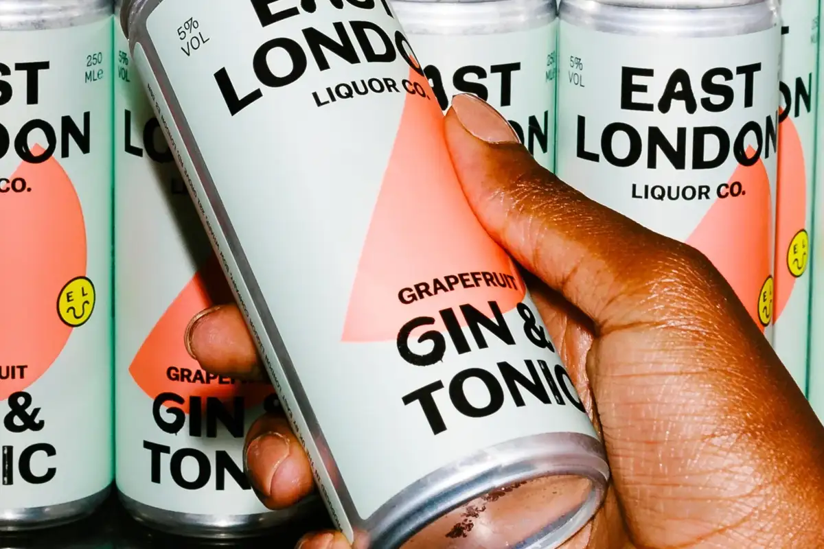 Premium RTD cocktail cans stocked in a retail fridge for fast sales