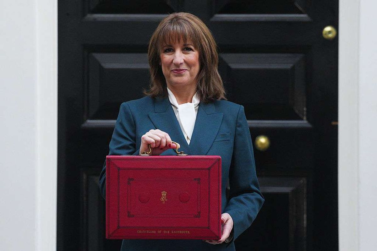 Rachel Reeves poses with the red Budget Box