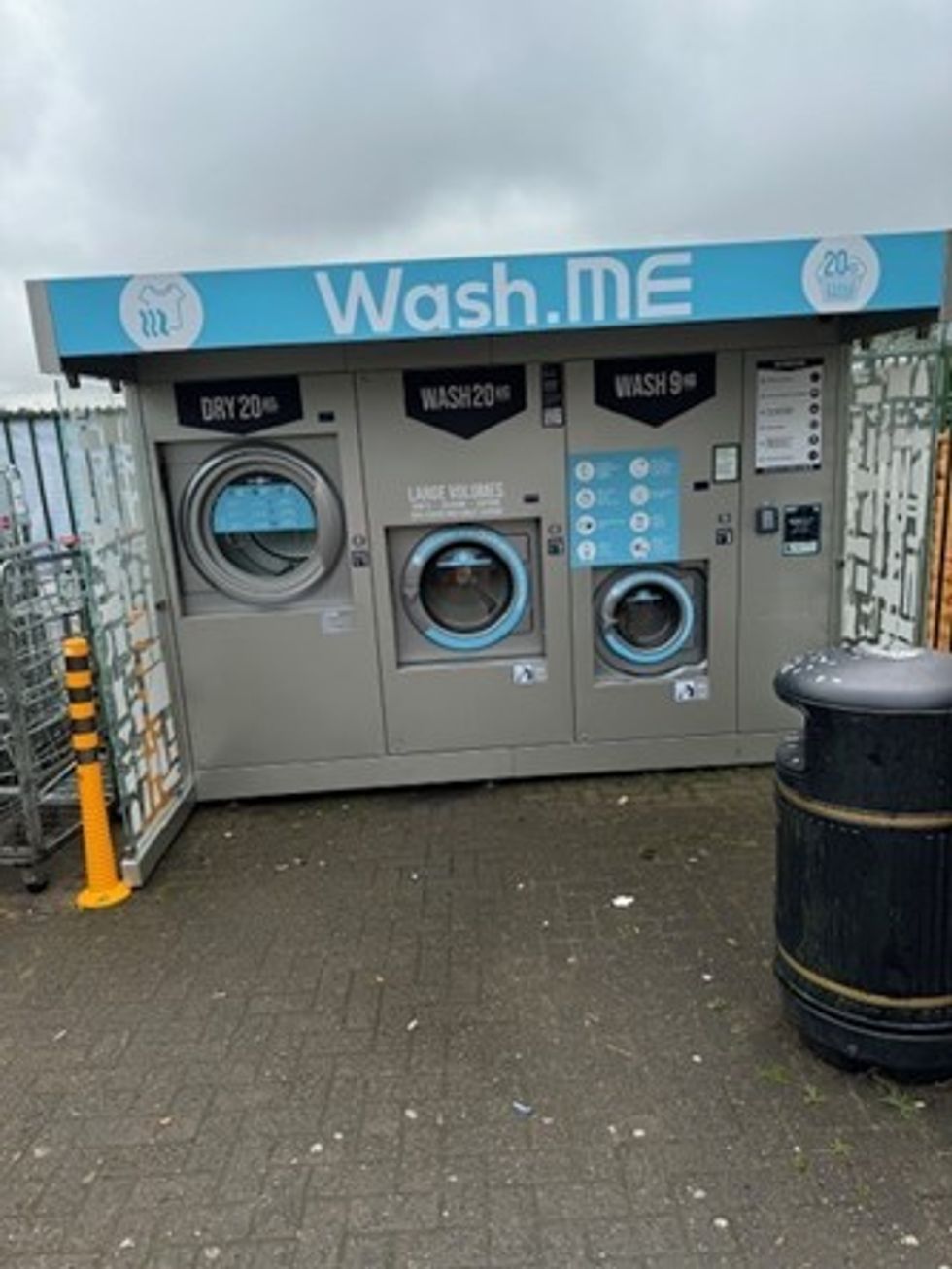 Self-service launderette outside Premier Rassau Stores, enhancing convenience in Ebbw Vale