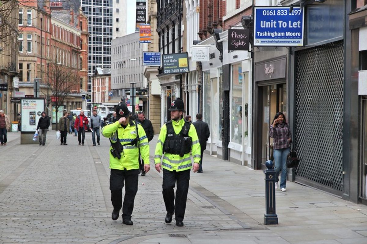 shop workers battle young rioters