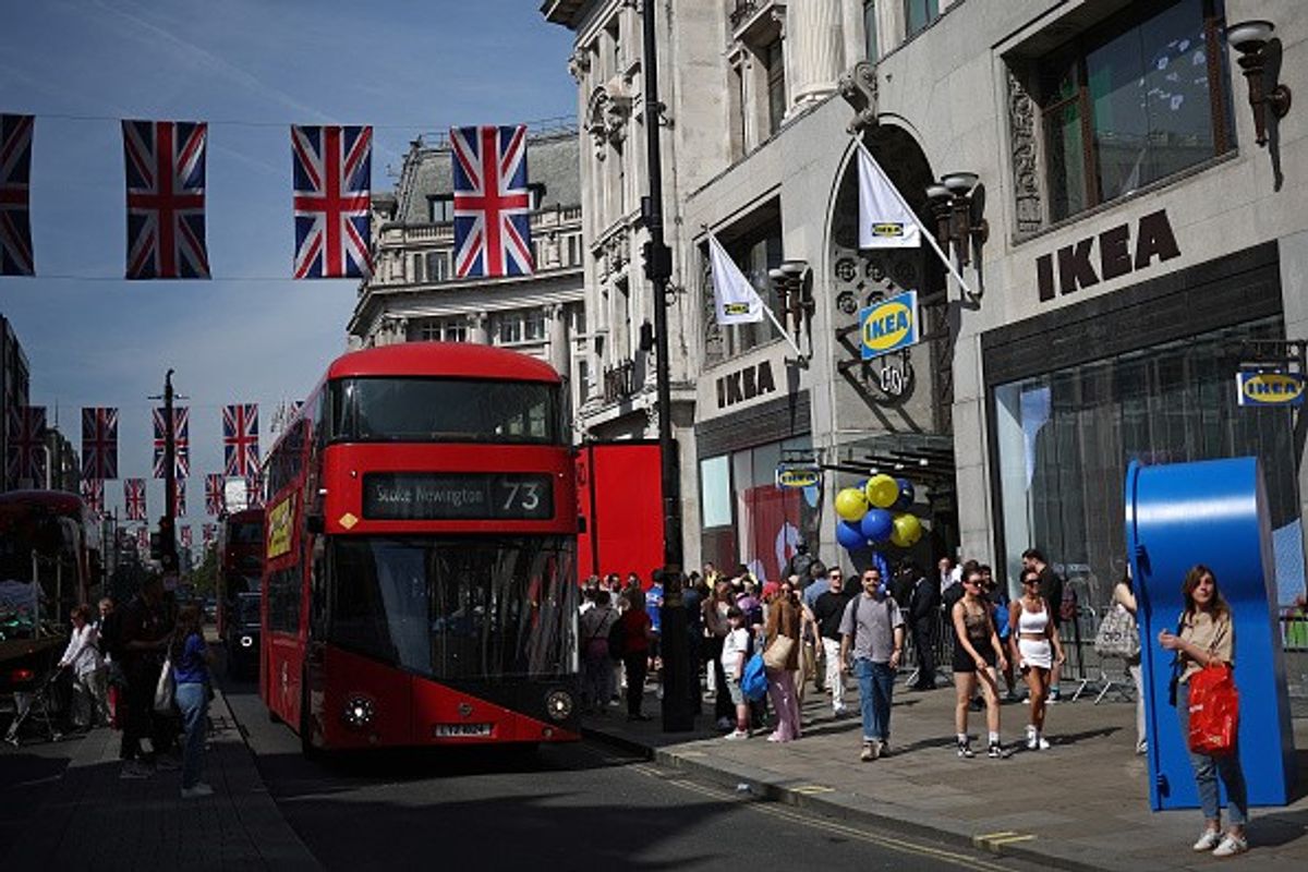 Shoppers at UK retail park in April 2025 enjoying warm weather and Easter attractions