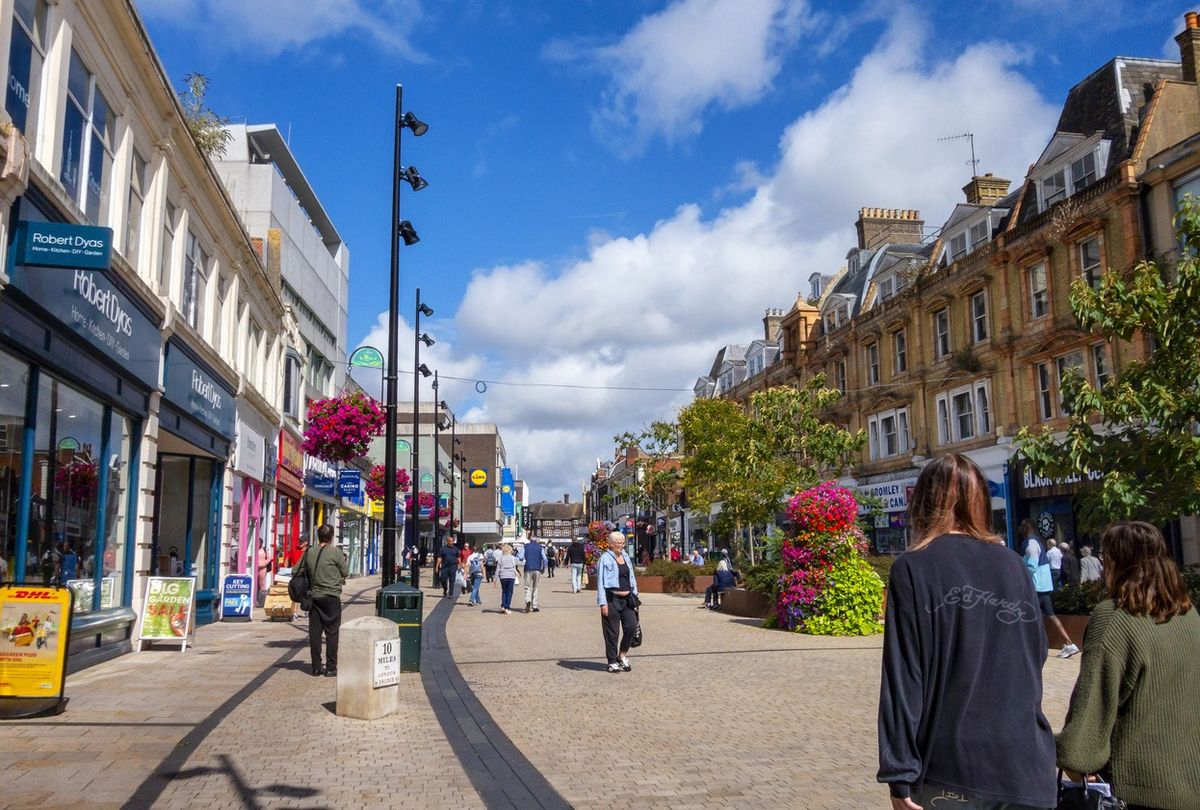 Shoppers in a pedestrianised section of the High Street in Bromley, Kent 