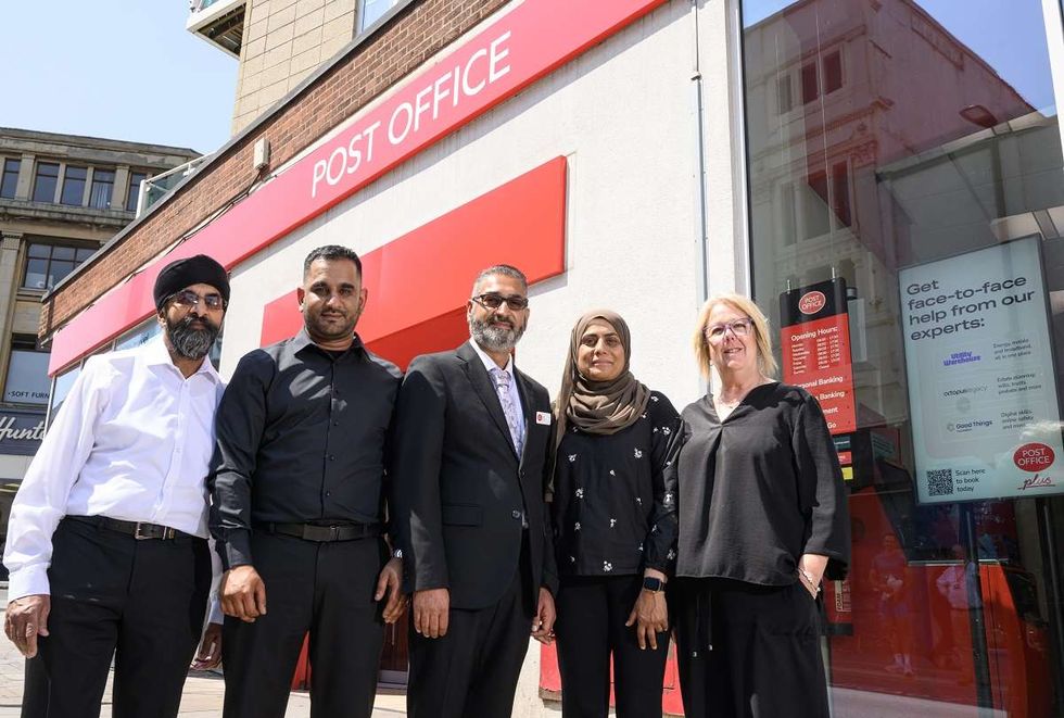 Sid Atwal Branch Manager at Derby City Post Office with his team