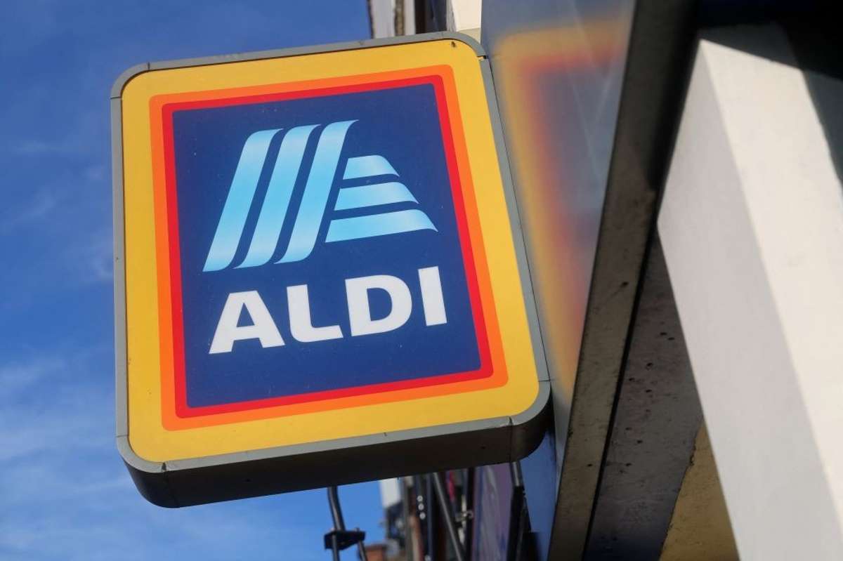 Signage is pictured outside an Aldi Local store on Kilburn High Road in London