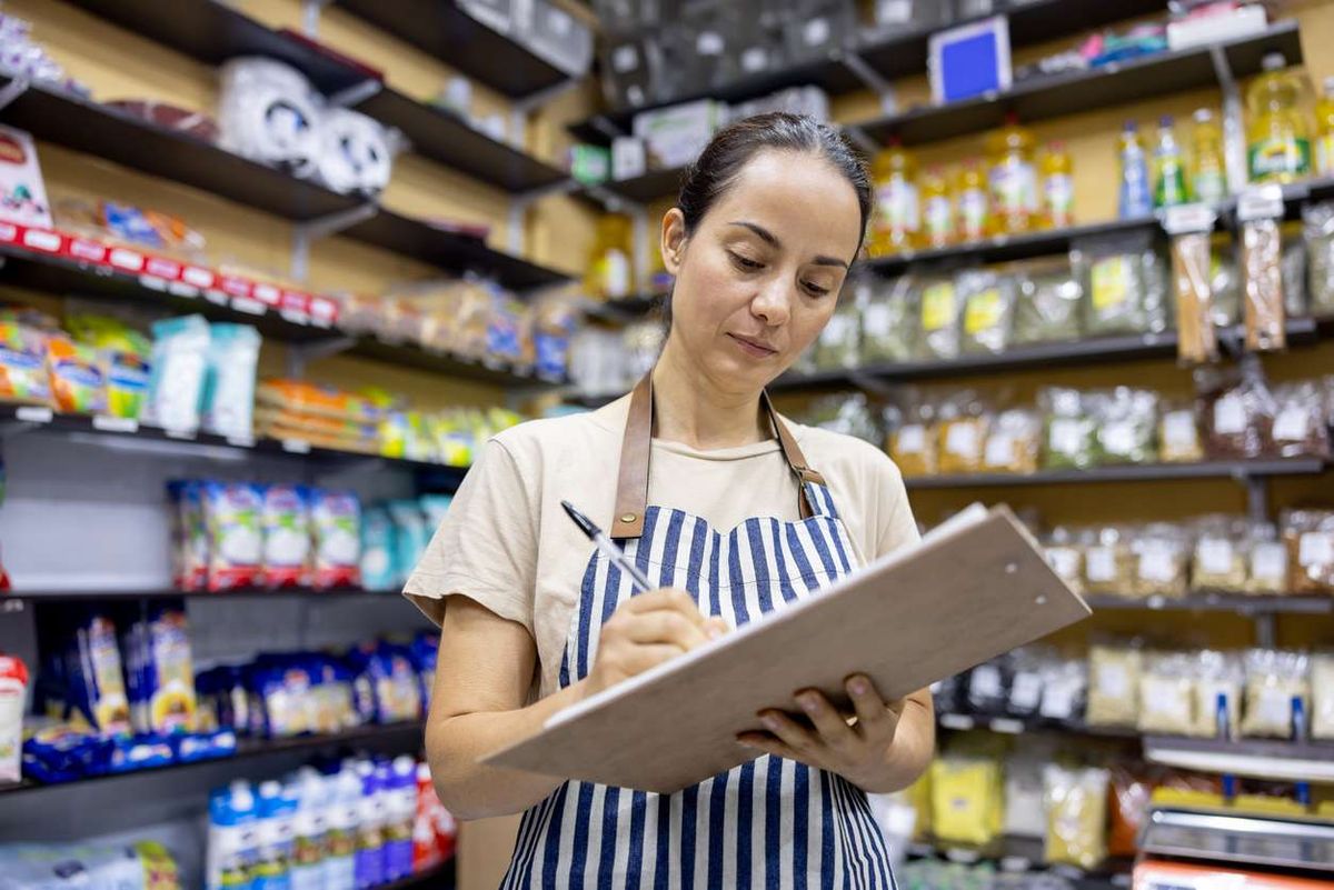 Small business owner working at a local food shop