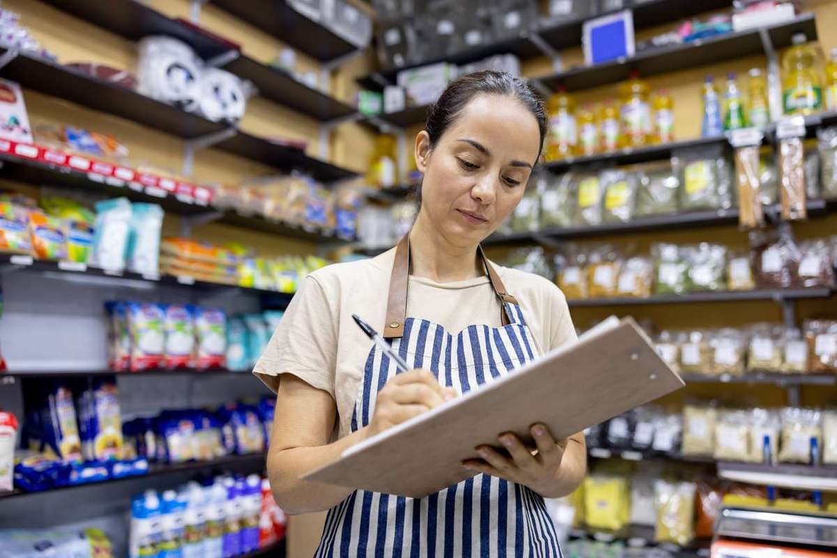Small business owner working at a local food shop