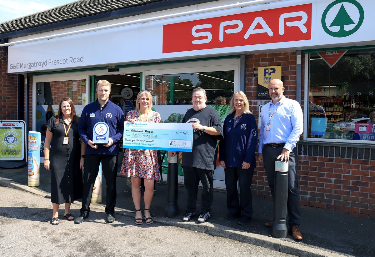 SPAR staff donate cheque to hospice