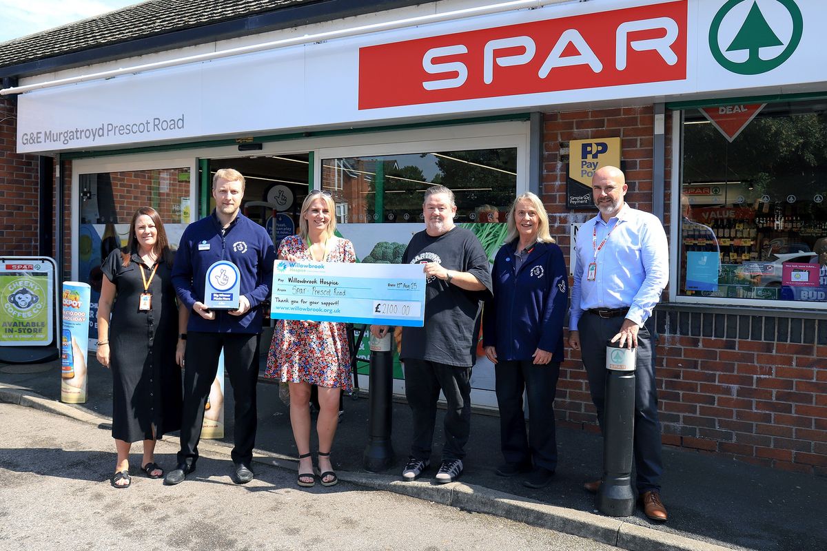 SPAR staff donate cheque to hospice