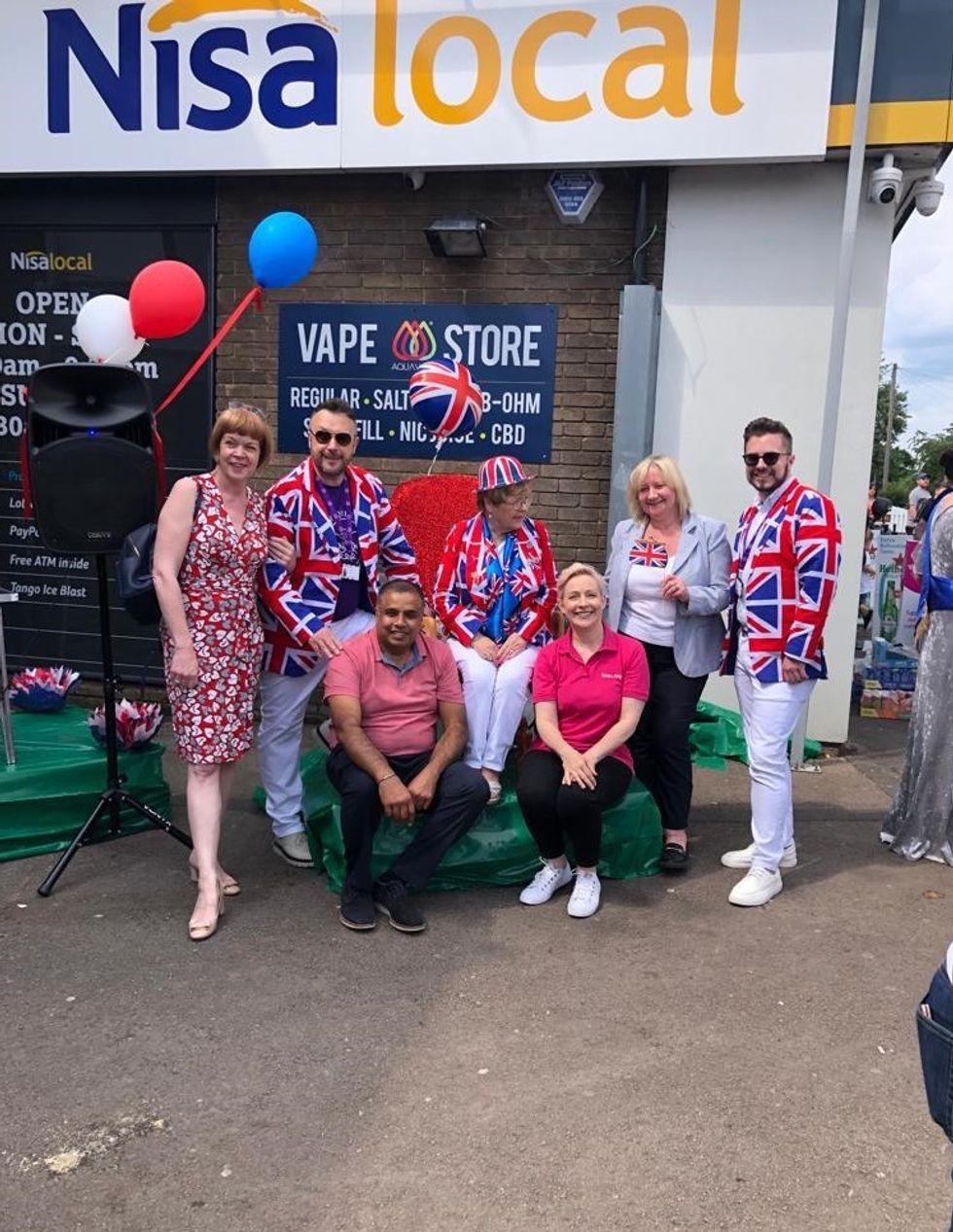 Store owner H centre left with local MP far left Lord Mayor centre and Kate Carroll Head of Nisas MADL charity centre right