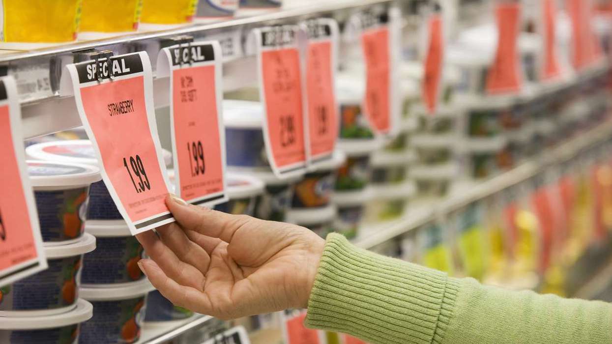 supermarket shopper checking prices