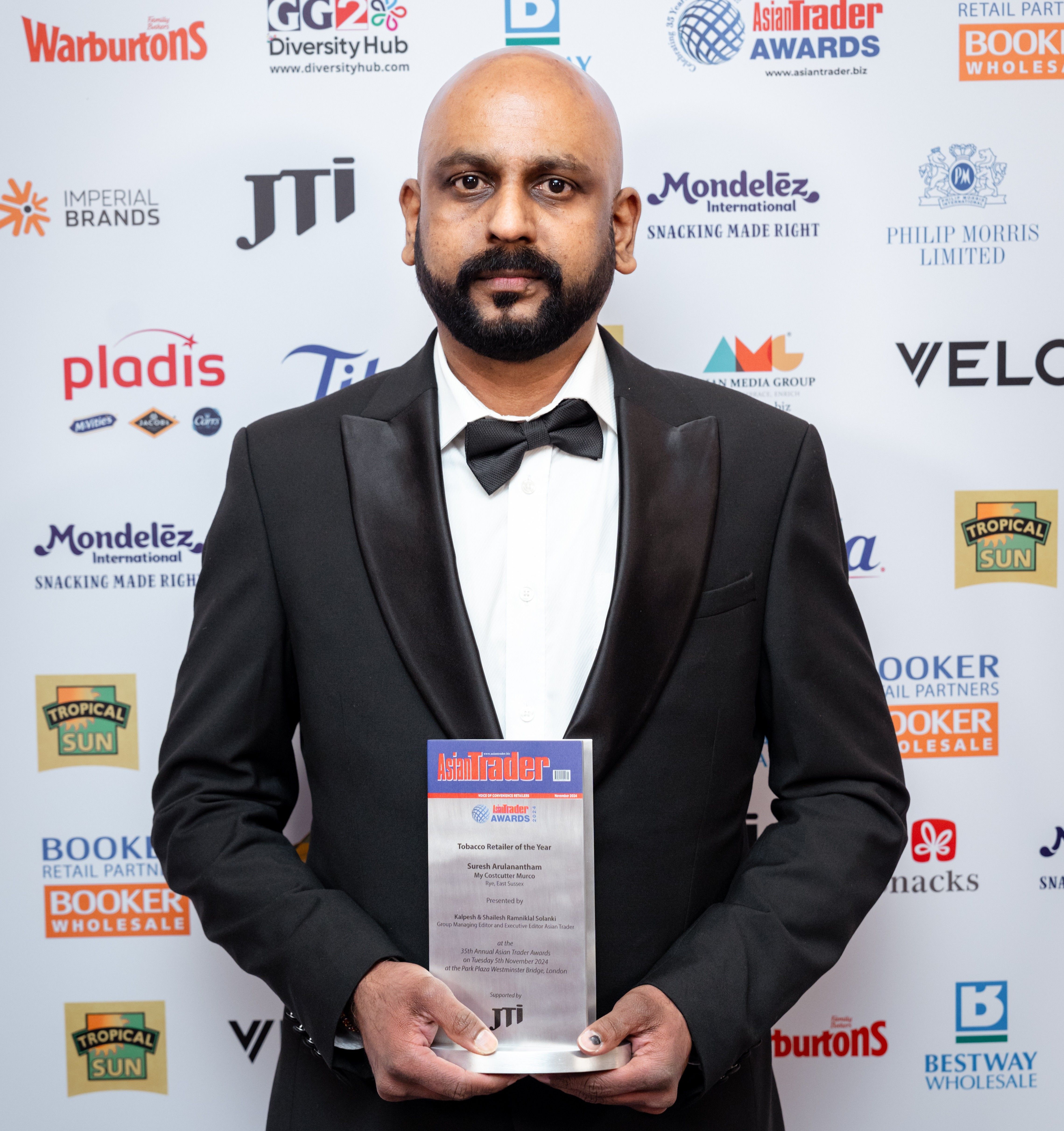 Suresh Arulanantham with Tobacco Retailer Award at Asian Trader Awards 2024