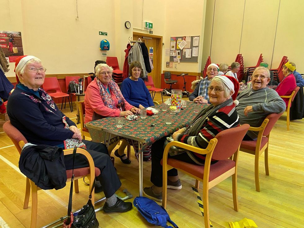 The Compleat Food Group prepares 50 Christmas meals for local charity.