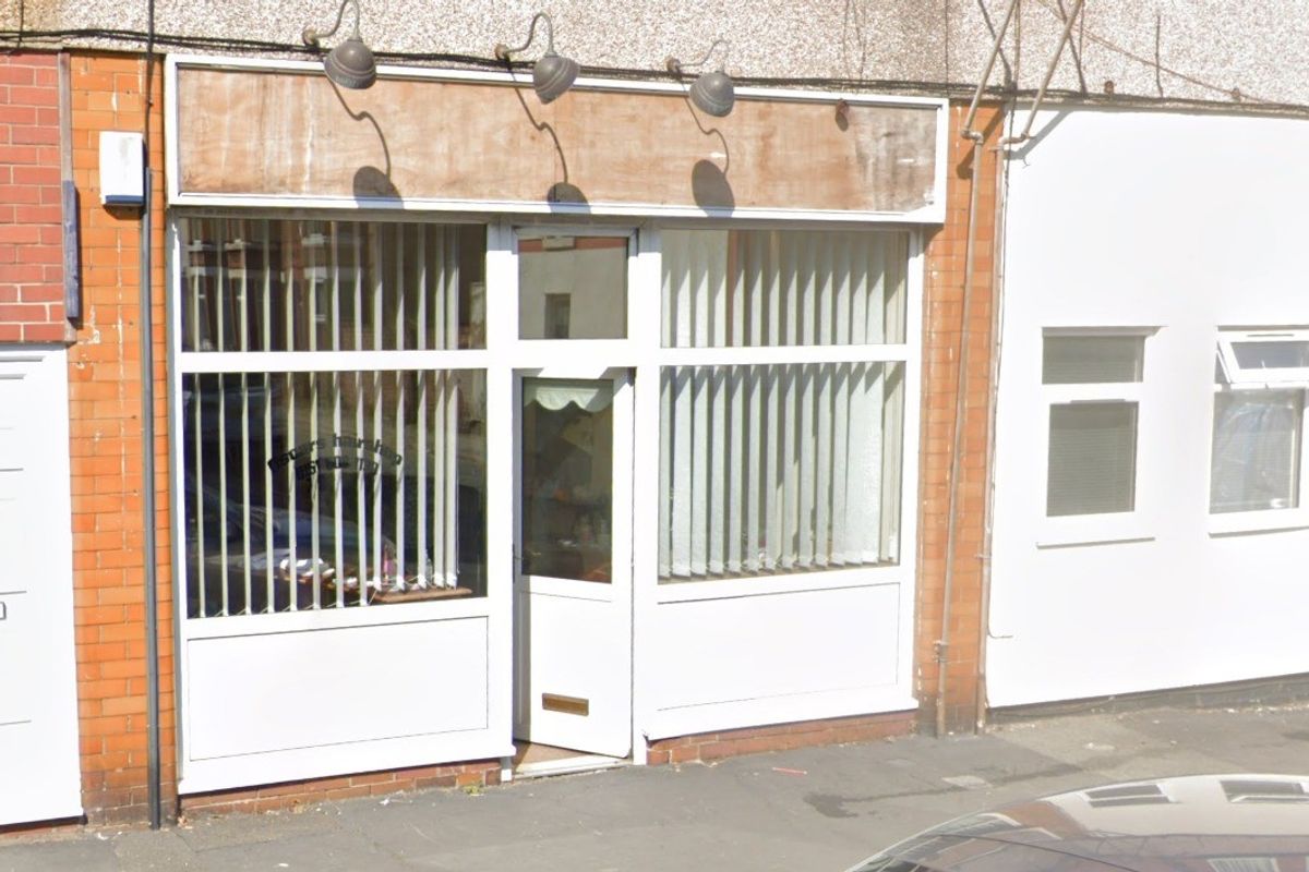 The vacant shop at 86 Woodchurch Lane, Prenton