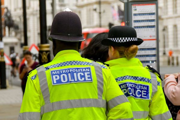Two police officers of the Metropolitan Police on patrol in central London