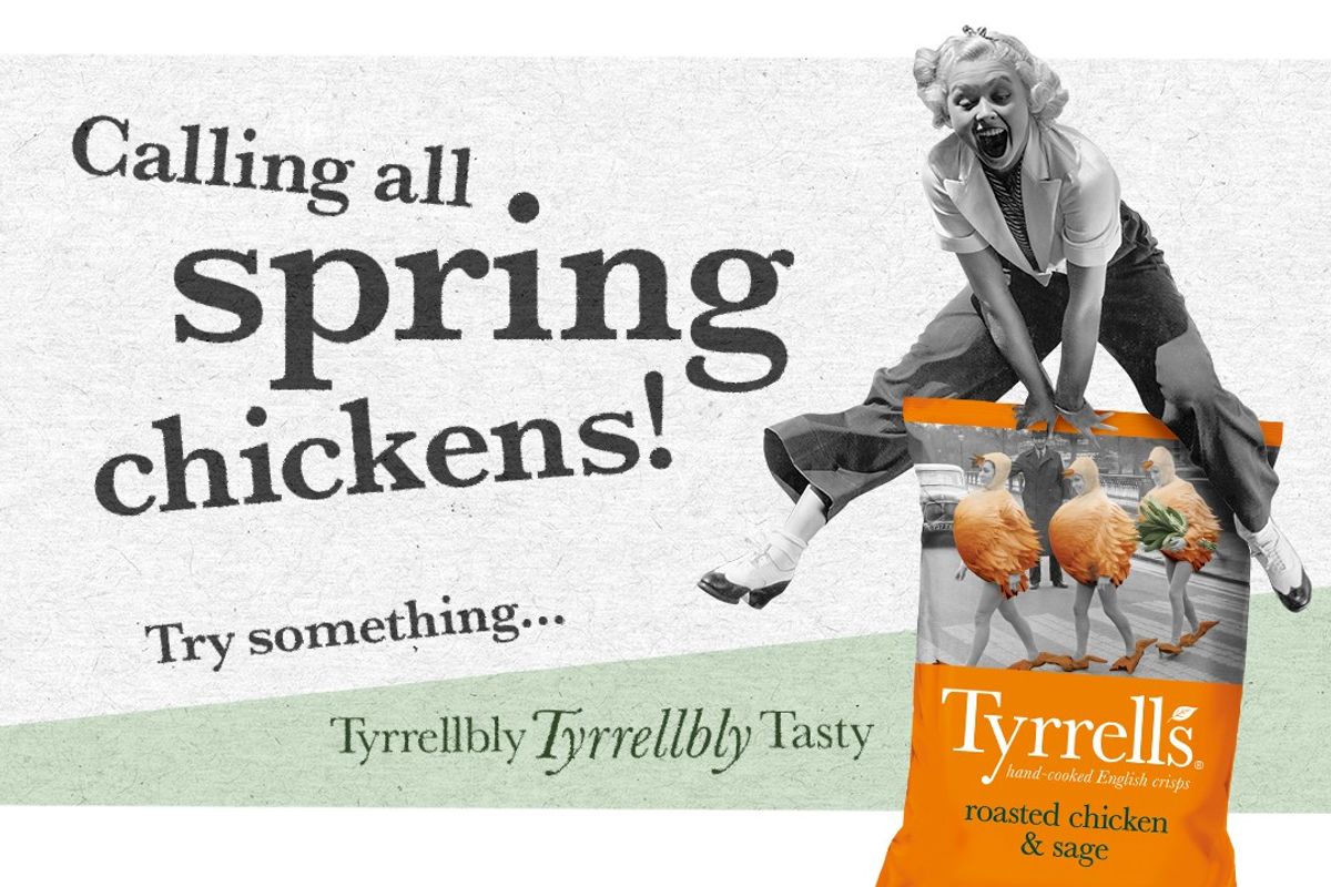 Tyrrells crisps on a spring picnic table with Easter decorations