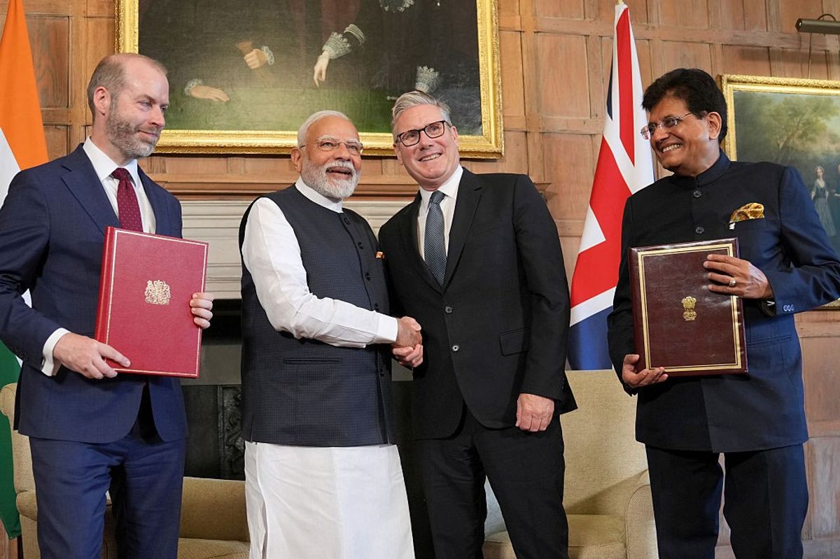 UK Prime Minister Keir Starmer and Indian PM Narendra Modi sign historic trade deal cutting tariffs on whisky, cars, and textiles