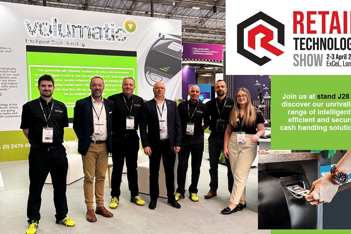 Volumatic team demonstrating CounterCache intelligent (CCi) cash handling solution at Retail Technology Show 2025, Stand J28