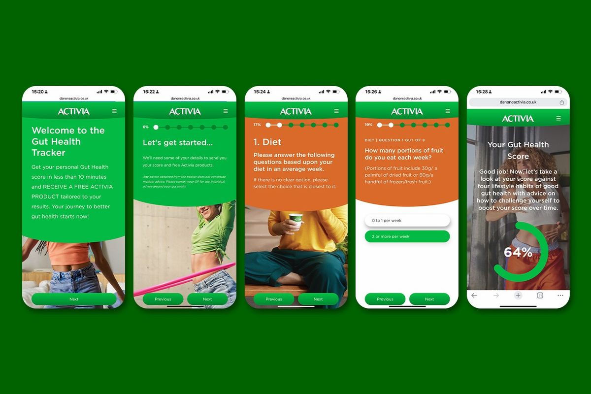 Woman using Activia Gut Health Tracker on mobile phone
