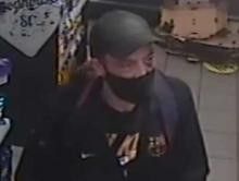 A year on, suspect who sprayed staff during shop robbery yet to be identified