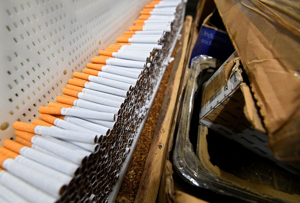 Counterfeit cigarettes with UK health warnings found ready for shipment in Belgium raids