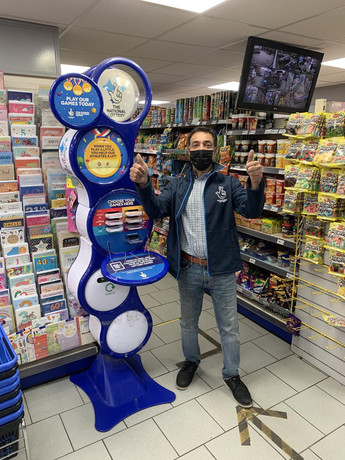 Livingston retailer Javed Iqbal wins £10,000 in Camelot quarterly draw