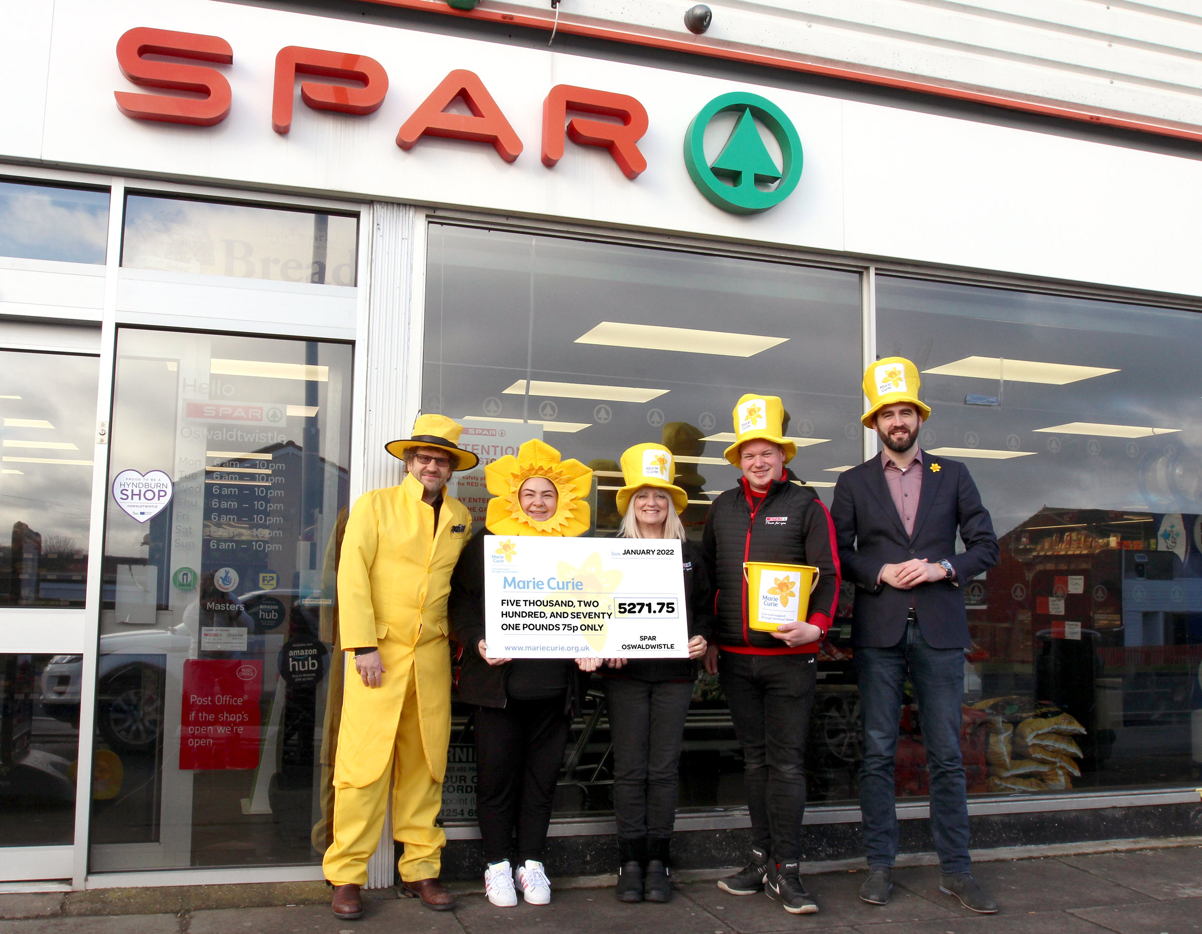 SPAR retailer James Hall marks £500,000 Marie Curie milestone