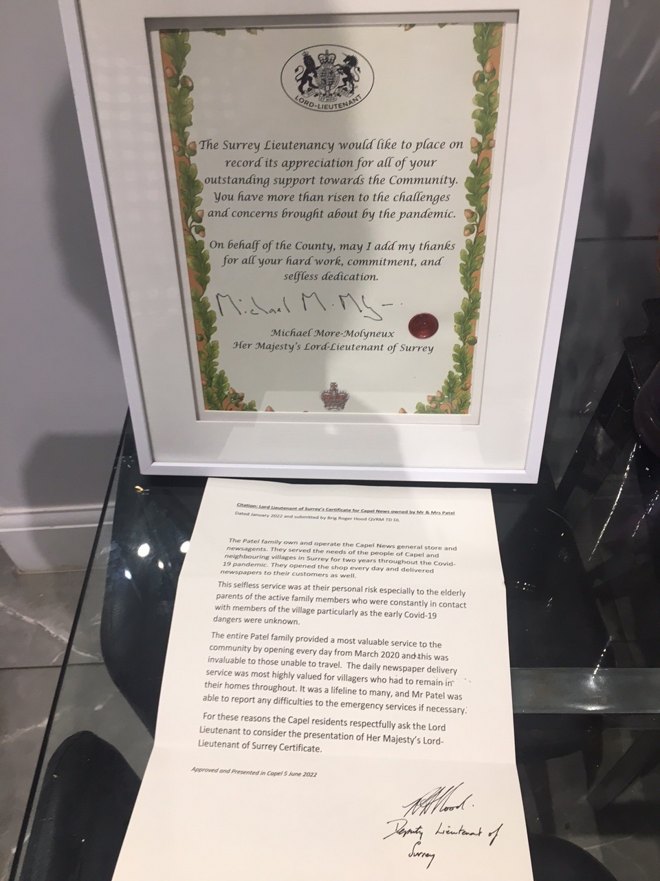 Surrey retailer dedicates Her Majesty’s award to fellow residents
